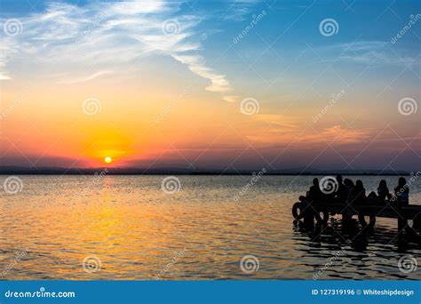 People Enjoying Sunset On A Lake Stock Photo Image Of Dawn Boat