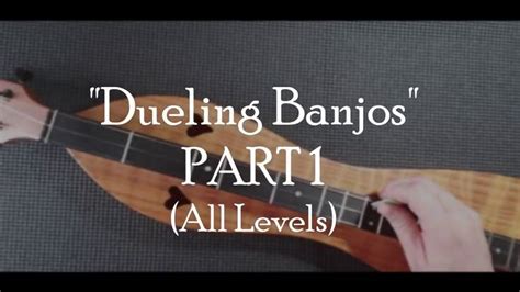 A Person Playing An Instrument With The Words Dueling Banjos Part 1 All