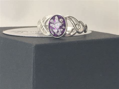 Huge range of cremation urns for ashes and ashes caskets designed, manufactured and distributed by us. Sterling silver Celtic ring with pet ashes embedded into ...