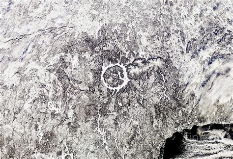 Manicouagan Lake Canada Impact Crater In Winter From Space Photograph