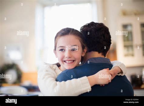 Happy Daughter Hugging Father Stock Photo Alamy