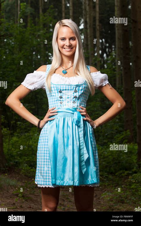 Blonde Woman In A Bavarian Dirndl Stock Photo Alamy