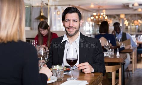 Portrait Of Couple Who Is Dining And Drinking Wine Stock Image Image