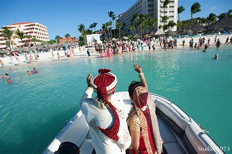 On the first day the couple spoke their vows according to christian tradition on the beach in one of the. Ceremony in Palm Beach, Aruba Destination Indian Wedding ...