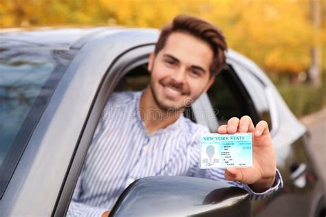 Man Holding Driving License In Car Closeup Stock Image Image Of