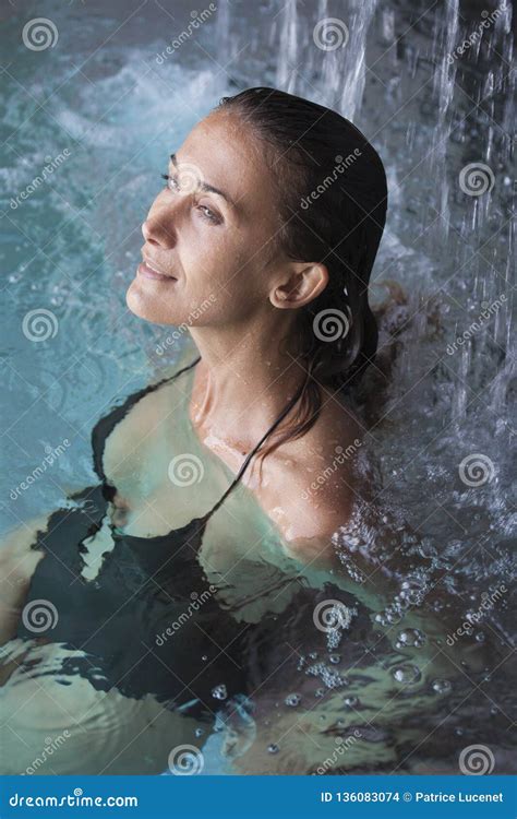 Woman In A Pool Under Waterfalls Stock Photo Image Of Relaxation