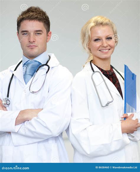Two Doctors With A Stethoscope Stock Photo Image Of Doctor Caucasian