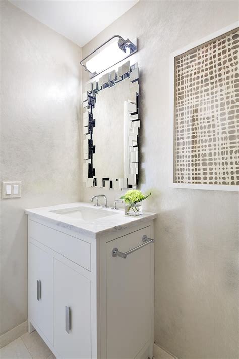 Contemporary Powder Room With Unique Mirror Hotel Style Bathroom