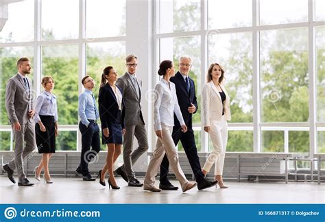 Business People Walking Along Office Building Stock Image Image Of