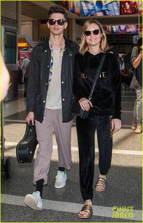 Brie Larson Fiancé Alex Greenwald Couple Up at LAX Photo