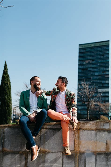 Stylish Gay Couple Talking In Sunlight By Stocksy Contributor Guille Faingold Stocksy