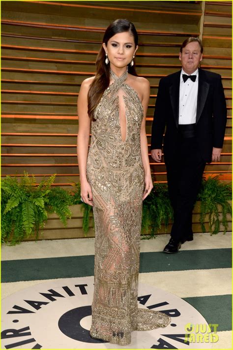 Selena Gomez Golden At The Vanity Fair Oscars Party 2014 Photo