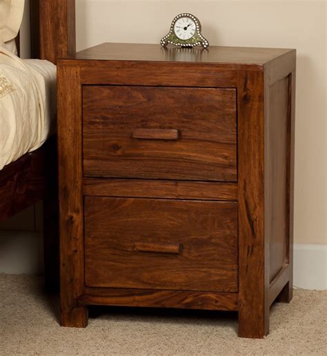 From high gloss to solid oak, check out our exclusive range of bedside tables and cabinets in different styles. Mandir Sheesham Bedside Table | Casa Bella Furniture UK