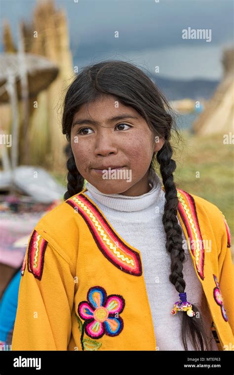 native girl portrait tribe of the urus lake titicaca puno region peru south america stock