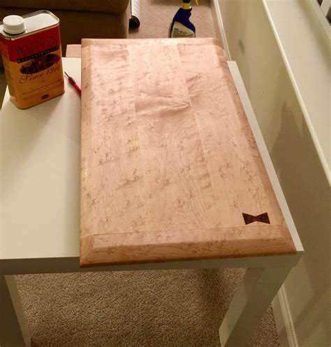 Elbows and bow ties on a table. Beveled, breadboard ended, bow tie splined, waterloxed end ...