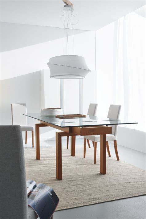 Some creative and beautiful options to traditional center tables have been making their way onto the scene. Hyper Table + Dolcevita Chair | Extendable dining table ...