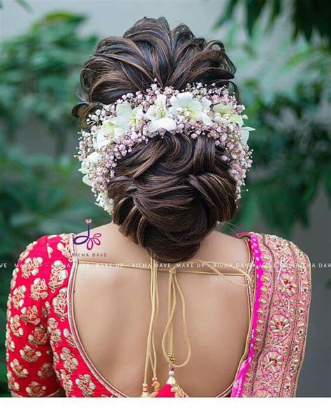 Retro curly bob with dramatic side sweep. 15 Indian Bridal Hairstyles With Flowers - Candy Crow