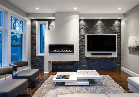 Hang a mirror above the mantel to make a small room look larger. Modern Electric Fireplaces to Warm Your Soul | Home ...