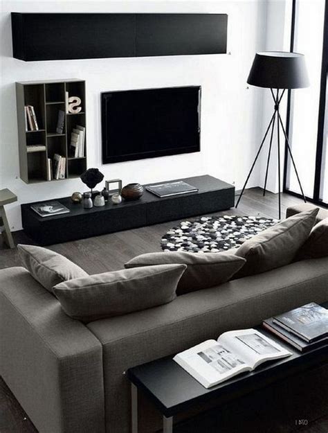 Minimalist Masculine Space With Black And Graphite Grey Furniture