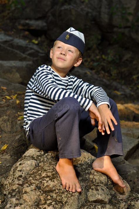 Sailor Boy Sitting On A Stone Stock Image Image Of Childhood Small