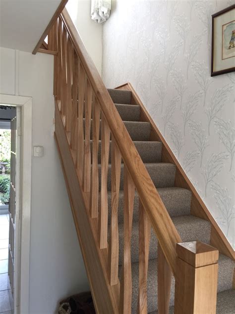 A Solid Oak Staircase Renovation With Twist Spindles Created By