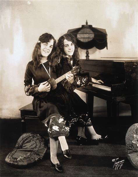 Daisy And Violet Hilton Conjoined Twins Playing Piano And Ukulele