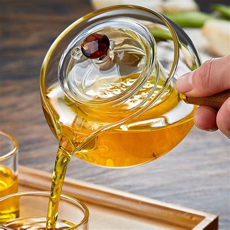 إبريق الشاي الزجاج الشفاف بحجم صغير إبريق الكونغ فو مع مقبض خشبي