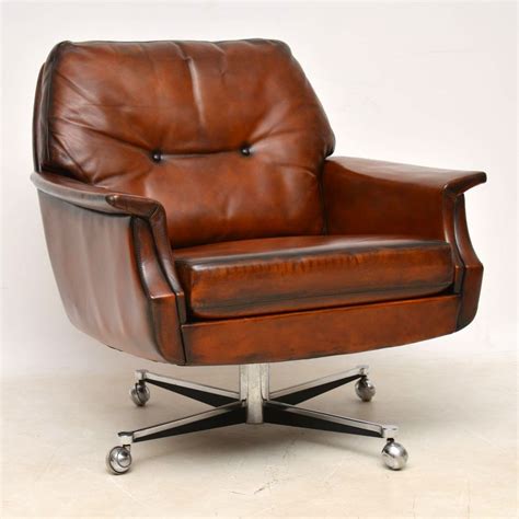 Weight capacity and a 17.5 seat height. 1960's Pair of Vintage Leather & Chrome Swivel Armchairs ...