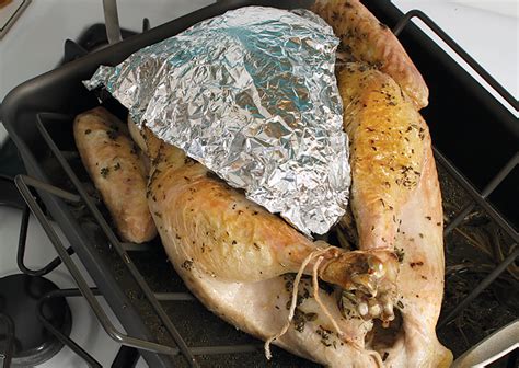 Remove netting and slice roast. How long to cook turkey covered in foil ALQURUMRESORT.COM