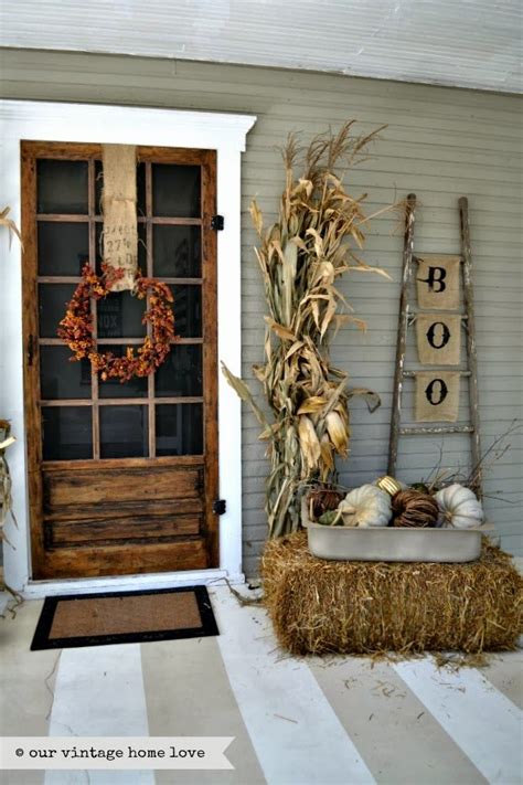 She also used cornstalks and pumpkins to bring out the fall theme. Fall Front Door Decor Ideas | The Garden Glove