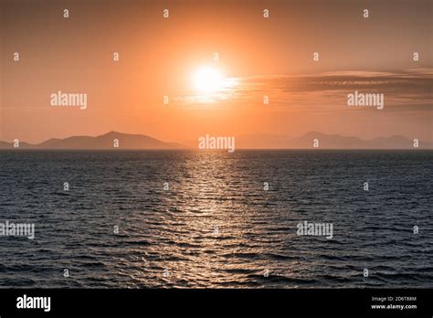 Pink Sunset Over Aegean Sea Stock Photo Alamy
