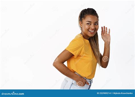 Happy Millennial Black Girl Saying Hello Waving Hand And Smiling