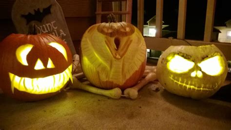 2013 Pumpkin Carving Daughters On The Left Toothy My Cobra In The