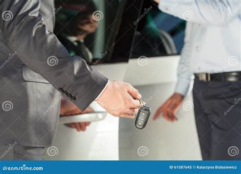 Car Dealer Giving Car Keys Stock Image Image Of Money 61587645