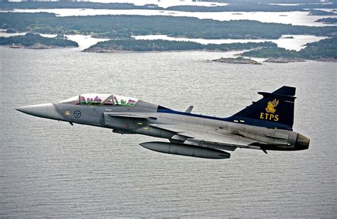 Swedish Air Force Saab Jas 39b Gripen Over The Ocean Aeronefnet
