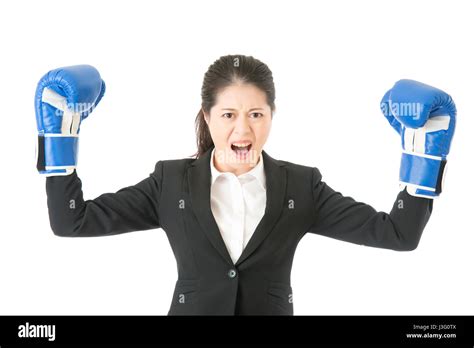 strong aggressive business woman concept businesswoman wearing boxing gloves showing flexing