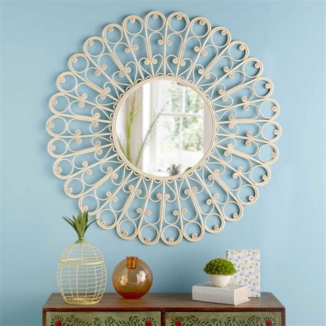 This rounded mirror is also multifunctional with a small front basket for storage. Round woven rattan mirror D 90 cm LOLA | Maisons du Monde