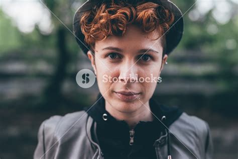 Portrait Of Young Beautiful Lesbian Redhead Woman Looking At Camera