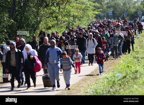 Hundreds Of Refugees Walk To The Hungarian Austrian Border Between Hegyeshalom And Nickelsdorf
