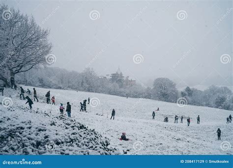 People Having Fun In Snow At Richmond Hill Viewing Point Editorial