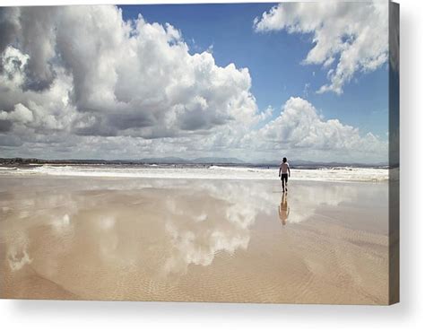 Man Walking On Beach With Clouds Acrylic Print By Jodie Griggs