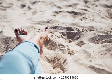 Woman Tanned Legs On Sand Beach Stock Photo Shutterstock