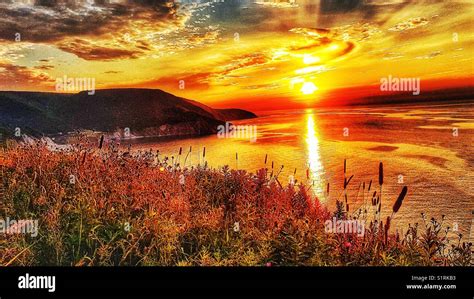 Sunset Over Coast Of Cape Breton Island Nova Scotia Canada Stock