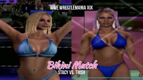 Stacy Keibler Vs Trish Stratus Bikini Match Wwe Wrestlemania Xix