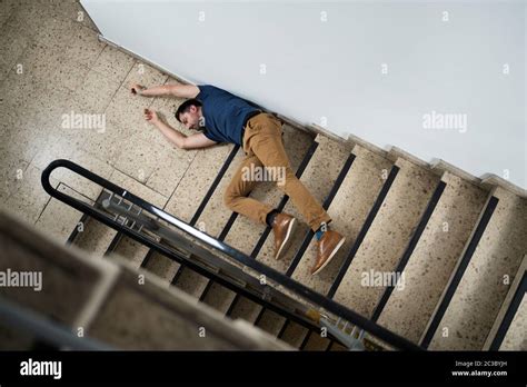 Man Falling Down Stairs High Resolution Stock Photography And Images
