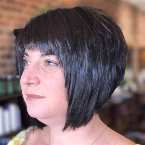 This bob looks like a cake with three layered sections. Short Black Angled Bob with Choppy Layers and Choppy Brow ...