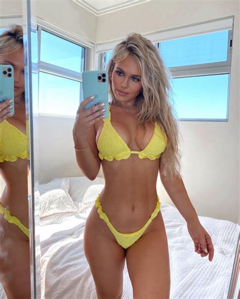 Swedish Bombshell Flaunts Flawless Physique In A Tiny Yellow Bikini Demotix