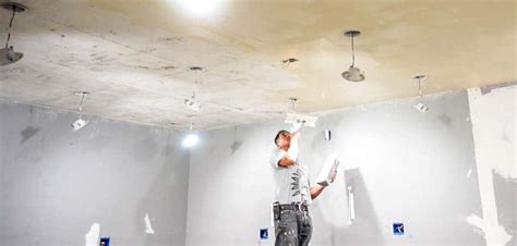 Mix and spray on your popcorn ceiling, then scrape. How to remove a popcorn ceiling and change into a smooth ...