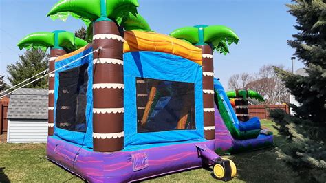 Dual Lane Tiki Tropical Bounce House And Waterslide