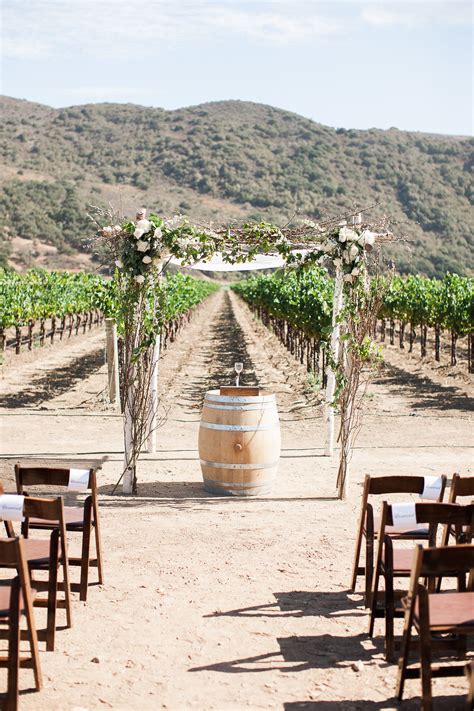 What A Pretty Ceremony With The Vineyard In The Back View The Full Wedding Here